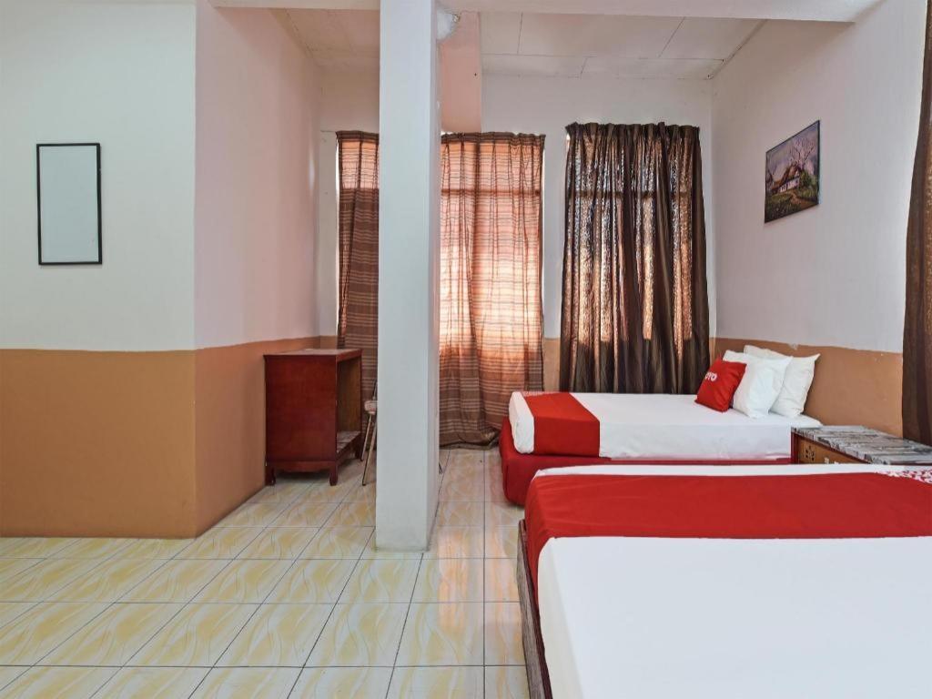Super Oyo Capital O 90659 Raintown Timbers Hotel ไทปิง ภายนอก รูปภาพ